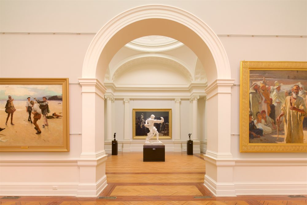 View of a statue through an arched doorway in the Art Gallery of NSW